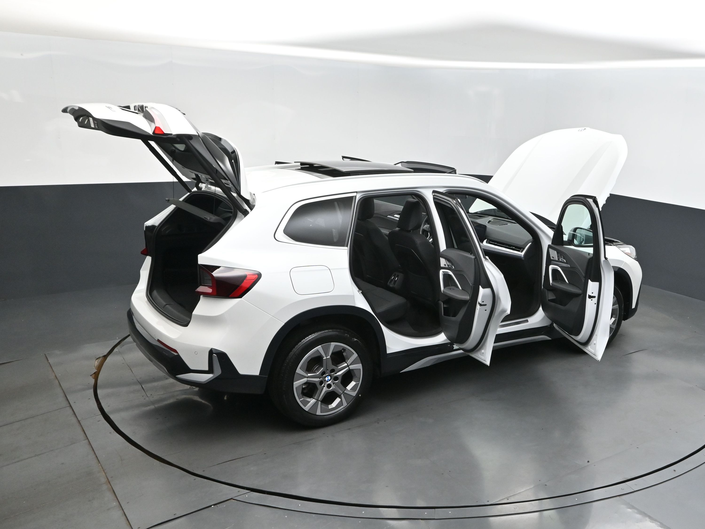2023 Mineral White Metallic BMW X1 xDrive28i AWD SUV